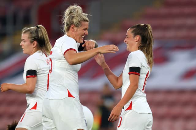 Mille Bright and Ella Toone celebrate their goals against North Macedonia in September