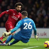 Mohamed Salah of Liverpool is challenged by Ben Foster of Watford during the Premier League match  (Photo by Richard Heathcote/Getty Images)