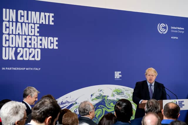Prime Minister Boris Johnson at the lunch of the COP26 UN Climate Summit. (Credit: Getty)