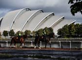 Police Scotland mounted officers patrol near the SSE Hydro venue in Glasgow.