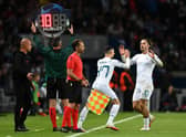 Phil Foden of Manchester City replaces teammate Jack Grealish during the UEFA Champions League group A match between Paris Saint-Germain and Manchester City