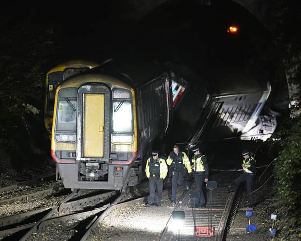 One train carriage was left on its side following the collision in Fisherton Tunnel between Andover and Salisbury (Picture: PA)