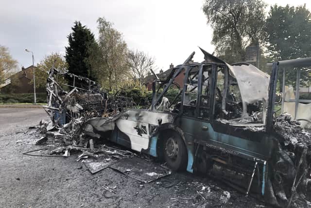 Masked men hijacked a bus before setting it alight in Newtownards.