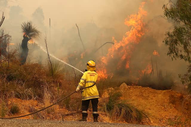 Fire crews control bush fires in Perth, Australia in February, 2021. (Credit: Getty)