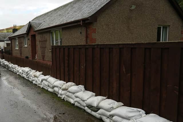 Homes surrounded with sand bags to prevent properties from flooding in Scotland on 29 October 2021 (Picture: Getty Images)
