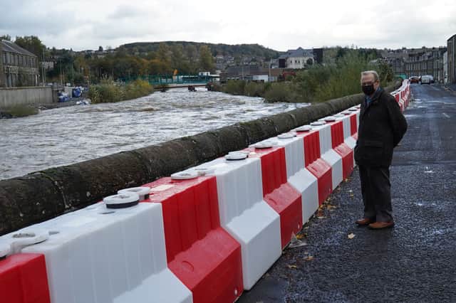 In October, residents of Hawick in Scotland were evacuated after flooding and flood defences were put in place (Picture: Getty Images)