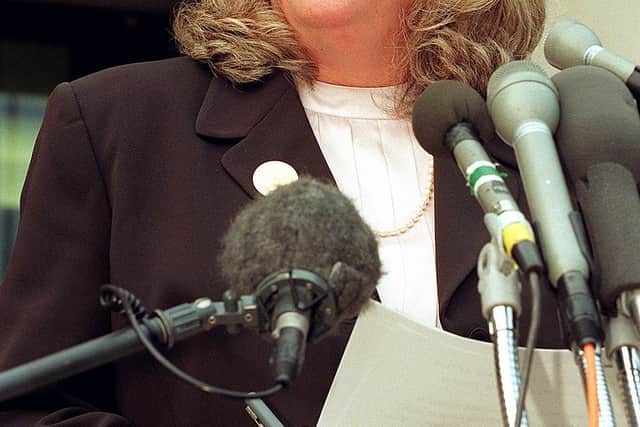 Linda Tripp talks to reporters outside of the Federal Courthouse 29 July in Washington, DC, following her eighth day of testimony before the grand jury investigating the Monica Lewinsky affair (Photo: WILLIAM PHILPOTT/AFP via Getty Images)