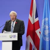 Prime Minister Boris Johnson speaking at a press conference during the Cop26 summit