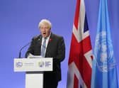 Prime Minister Boris Johnson speaking at a press conference during the Cop26 summit