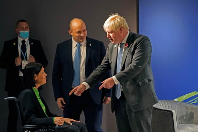 Iraeli Energy Minister Karine Elharrar meets with Prime Minister Boris Johnson after not being given access to the COP26 venue due to disabled access issues. (Credit: Getty). 