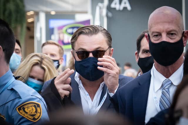 Leonadro DiCaprio is mobbed by attendee as he makes an appearance at COP26 summit in Glasgow. (Credit: PA)