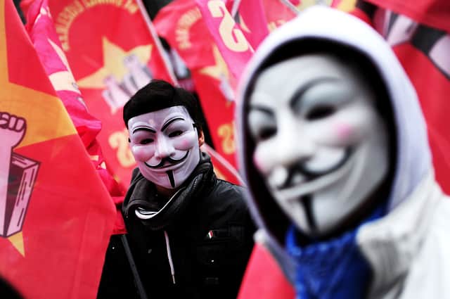 Guy Fawkes masks are now worn as a symbol of rebellion in protests around the world, from the USA to Turkey and Hong Kong (image: AFP/Getty Images)