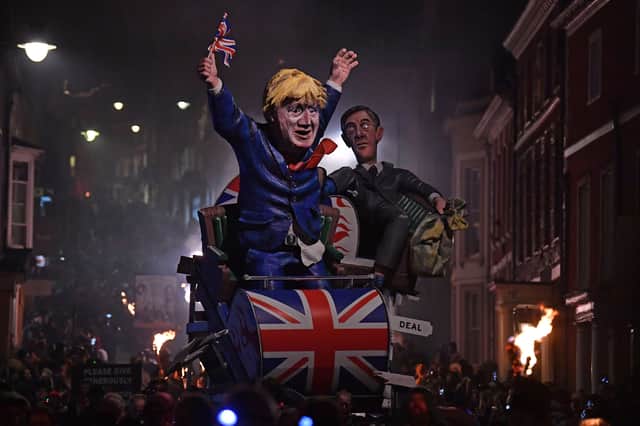 To this day, effigies of Guy Fawkes - and current political leaders - are burnt on bonfires around the UK (image: AFP/Getty Images)