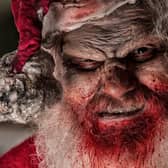 Parents have reacted with horror to allegations on Facebook that someone has been posing as an ‘evil Santa’ online and targeting kids (image: Getty Images via Canva Pro)