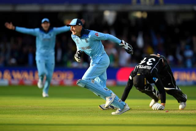 Jos Buttler celebrates running out Martin Guptill sealing England’s win at the 2019 ODI World Cup