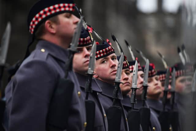 Military personnel attend a wreath laying at the Stone of Remembrance in Edinburgh in 2019 (Picture: Getty Images)