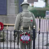 A life-sized knitted soldier has been placed at the War Memorial Clock Tower, in Syston, Leicestershire, by an anonymous knitter, known only as Knitting Banksy, ahead of Remembrance Day. (Pic: PA)