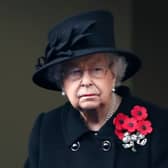 In recent years, the Queen has been seen wearing five poppies on Remembrance Sunday (image: AFP/Getty Images)