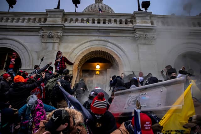 Trump supporters clash with police and security forces as people try to storm the US Capitol on January 6 in Washington (photo: Brent Stirton/Getty Images)