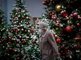 With high levels of Covid immunity and a strong booster vaccination programme, a leading scientist has warned a lockdown at Christmas is unlikely to happen (Photo by NATALIA KOLESNIKOVA/AFP via Getty Images)