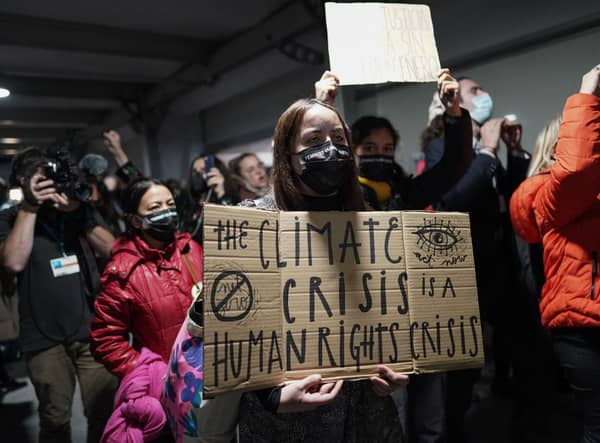 Climate Change protesters outside COP26 during the final day of the UN summit (Picture: Getty Images)