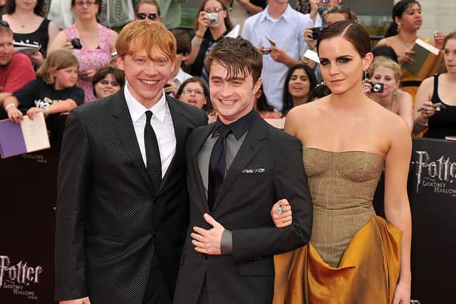 Rupert Grint, Daniel Radcliffe and Emma Watson attending the New York premiere of Harry Potter And The Deathly Hallows: Part 2 (Photo: Stephen Lovekin/Getty Images)