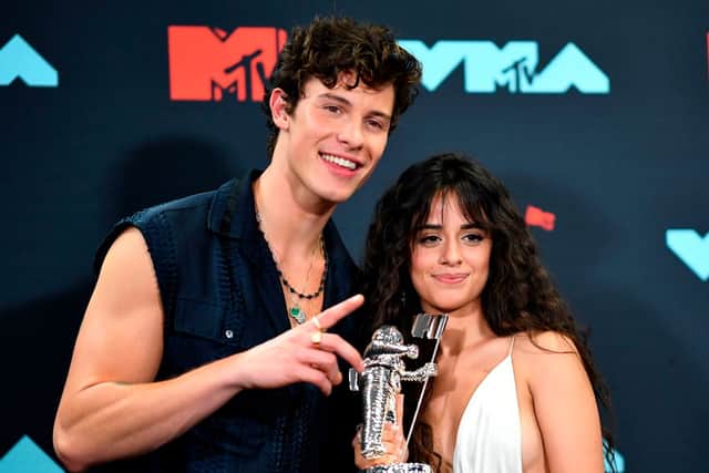 Shawn Mendes and Camila Cabello pose with an award during the 2019 MTV Video Music Awards (Photo: JOHANNES EISELE/AFP via Getty Images)
