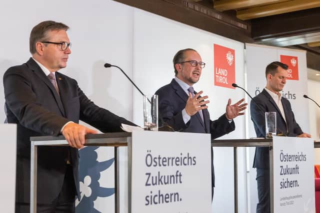 Austrian Chancellor Alexander Schallenberg (middle) has announced the new restrictions in a move he called “painful”. (Credit: Getty)