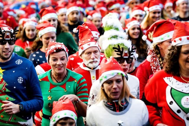 Will you be cracking out the Christmas jumper this Christmas Jumper Day? (Photo: KOEN VAN WEEL/AFP via Getty Images)