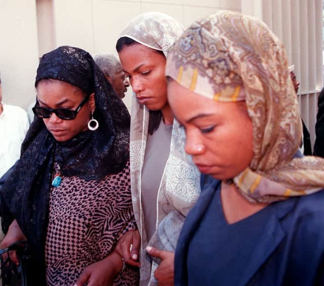 (L-R) Malikah, Malaak and Qubilah Shabazz attending the funeral of their mother (Photo: BOB STRONG/AFP via Getty Images)