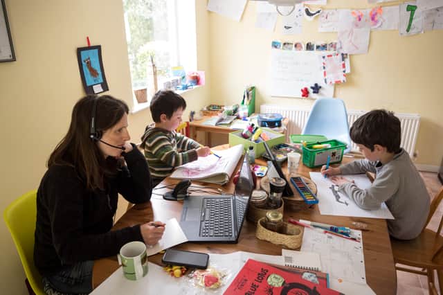 A mother in Huddersfield balances working from home with home schooling (Photo: Getty)