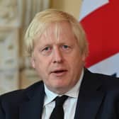 Boris Johnsonj has said that France must “do more” to curb migrant crossings after a boat capsized in the English Channel killing 27 people. (Credit: Getty)