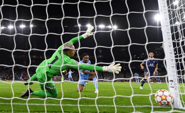 Raheem Sterling of Manchester City scores their team's first goal past Keylor Navas of Paris Saint-Germain during the UEFA Champions League group A match between Manchester City and Paris Saint-Germain at Etihad Stadium