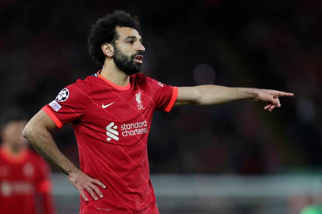 Mohamed Salah of Liverpool gives instructions to his team mates during the UEFA Champions League group B match between Liverpool FC and FC Porto at Anfield