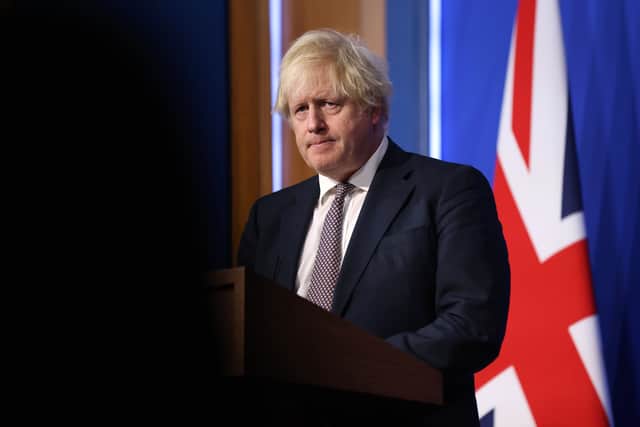 Prime Minister Boris Johnson speaks during a press conference after cases of the new Covid-19 variant were confirmed in the United Kingdom on November 27, 2021