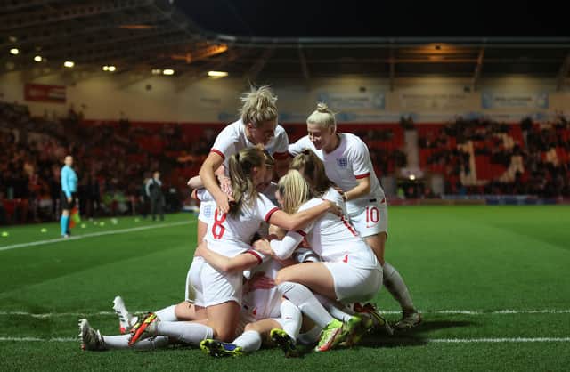 Ellen White of England celebrates with team mates. (Photo by Catherine Ivill/Getty Images)