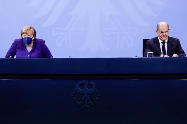 Outgoing German Chancellor, Angela Merkel, and her likely replacement Olaf Scholz have announced a new nationwide lockdown for all unvaccinated German citizens. (Credit: Getty)