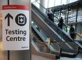 A Covid testing centre sign at Heathrow Terminal 5 (Photo: Hollie Adams/Getty Images)