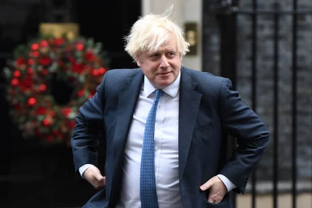 <p>Boris Johnson has previously promised that Christmas 2021 would be ‘considerably better’ than last year's (image: AFP/Getty Images)</p>