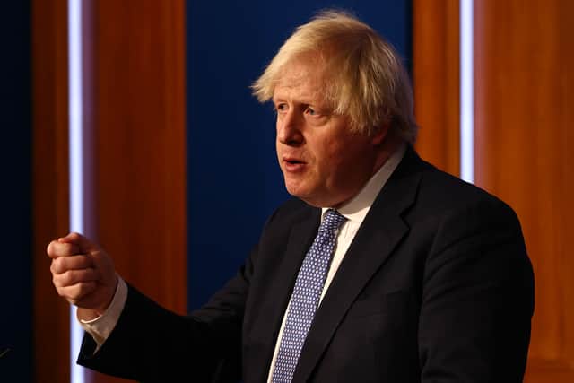 Boris Johnson addressed the public at a press conference announcing a move to ‘Plan B’ restrictions. (Credit: Getty)