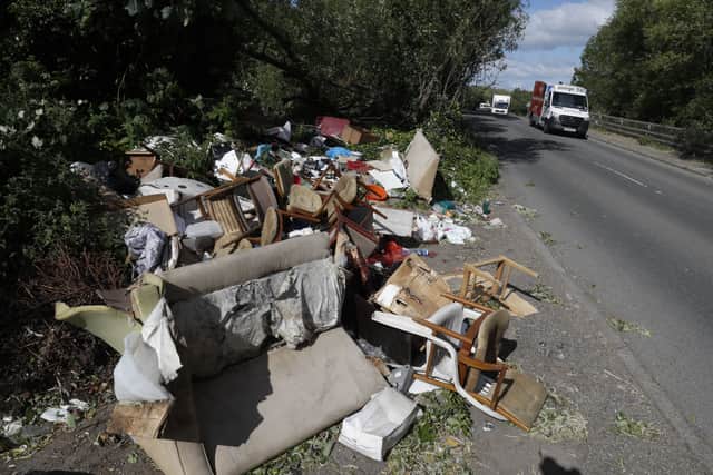 Fly-tipped rubbish and waste is seen beside a road in Colnbrook, near Heathrow, west of London on May 11, 2020(image: AFP via Getty Images)