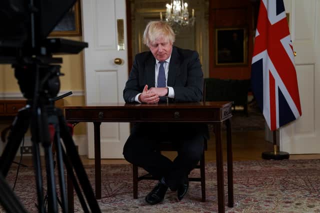 <p>Boris Johnson addresses the public to provide an update on the Covid-19 booster programme (Photo: Getty)</p>