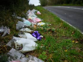 Flowers lay at the scene where Harry Dunn was killed after a car collided with the motorbike he was riding on 27 August 2019. (Pic: Getty)