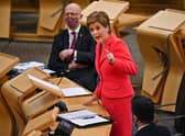 Nicola Sturgeon has urge Scots to limit their social mixing ahead of Christmas Day as Covid cases surge across the UK. (Credit: Getty)