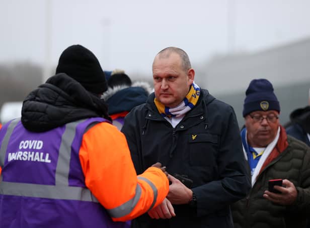 <p>Fans have their Covid-19 passes checked as they arrive at the stadium prior to the Premier League match between Leeds United and Arsenal (Photo: Getty)</p>