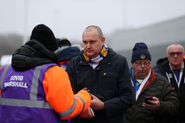 <p>Fans have their Covid-19 passes checked as they arrive at the stadium prior to the Premier League match between Leeds United and Arsenal (Photo: Getty)</p>