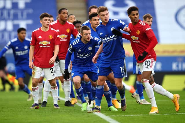 Players jostle for position as a free kick is delivered during the Premier League match between Leicester City and Manchester United at The King Power Stadium on December 26, 2020 