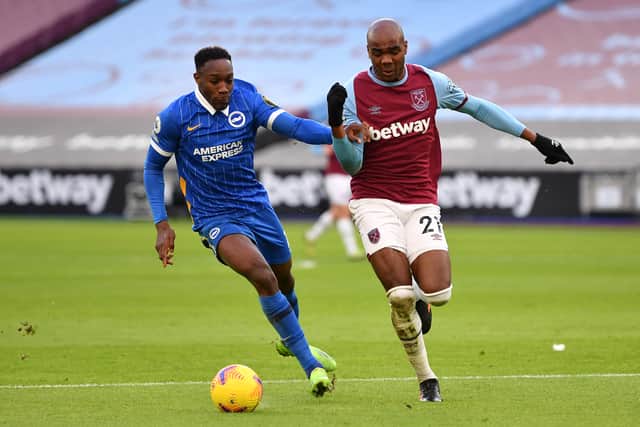 Angelo Ogbonna of West Ham United holds off Danny Welbeck of Brighton & Hove Albion during the Premier League match between West Ham United and Brighton & Hove Albion at London Stadium on December 27, 2020