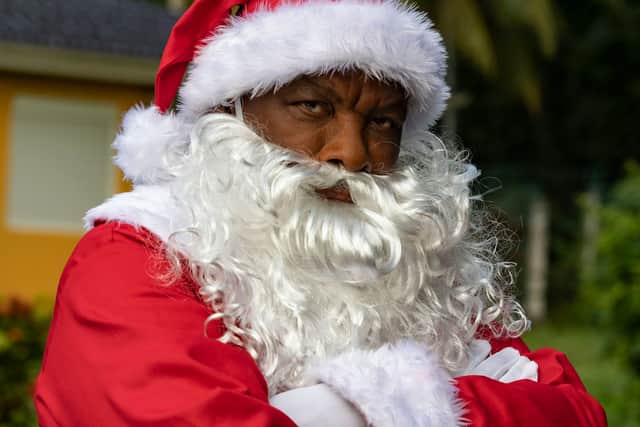 Don Warrington as Commissioner Selwyn Patterson as Father Christmas (Credit: BBC/Red Planet/Denis Guyenon)