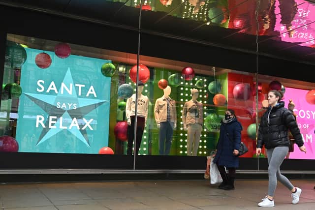 Most businesses are closing their doors earlier than they would on a typical Friday on Christmas Eve (image: AFP/Getty Images)